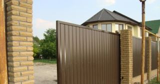 Купить откатные ворота из профнастила Ишим, цена от 1762 руб.